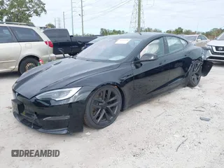 2023 Tesla Model S with VIN 5YJSA1E52PF500088, listed as a IAAI auction lot 41372918 with Not provided miles and . Bid and sale history available at DreamBid. Image 18.