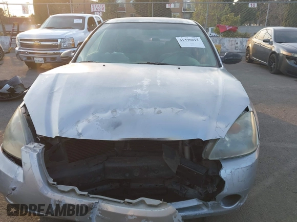 2002 Nissan Altima S with VIN 1N4AL11D72C174190, listed as a IAAI auction lot 41390812 with 171,646 mi miles. Bid and sale history available at carsss.com. Image 12.