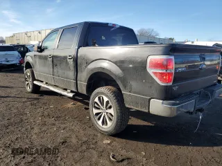 2012 Ford F-150 XL with VIN 1FTEW1CM2CFB29092, listed as a Copart auction lot 43718415 with 165,364 mi miles and Salvage Title. Bid and sale history available at carsss.com. Image 2.