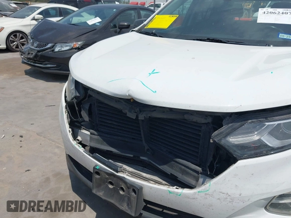 2018 Chevrolet Equinox LT with VIN 2GNAXJEV4J6312574, listed as a IAAI auction lot 42062407 with 126,106 mi miles and . Bid and sale history available at DreamBid. Image 6.