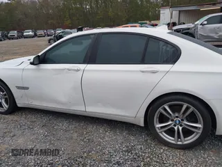 2014 BMW 7 Series 740i with VIN WBAYA6C51ED144387, listed as a IAAI auction lot 41226638 with 161,448 mi miles. Bid and sale history available at carsss.com. Image 14.