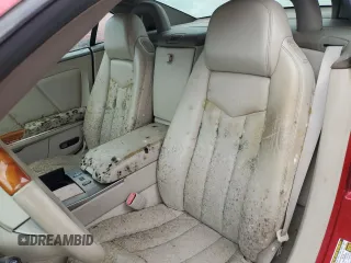 2005 Cadillac XLR z VIN 1G6YV34A855601016, wystawiony jako Copart lot #74436784 z przebiegiem Nie podano mil oraz Szkody całkowita. Historia ofert i sprzedaży dostępna na DreamBid. Obrazek 10.