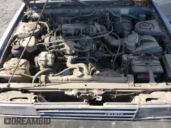 1986 Toyota Camry z VIN JT2SV16E6G0520922, wystawiony jako Copart lot #47146675 z przebiegiem 156 394 mil mil oraz Szkoda całkowita • Salvage title. Historia ofert i sprzedaży dostępna na DreamBid. Obrazek 11.