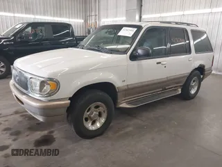 2000 Mercury Mountaineer z VIN 4M2ZU86P7YUJ40690, wystawiony jako IAAI lot #42367495 z przebiegiem 202 988 mil mil oraz . Historia ofert i sprzedaży dostępna na DreamBid. Obrazek 2.