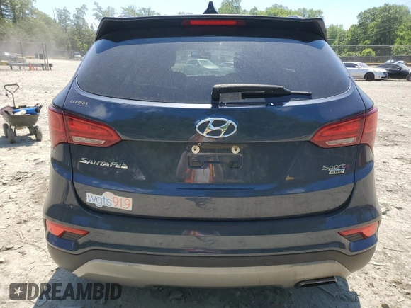 2017 Hyundai Santa Fe 2.4L z VIN 5NMZUDLB7HH028678, wystawiony jako Copart lot #57557855 z przebiegiem 102 049 mil mil oraz Szkoda całkowita • Salvage title. Historia ofert i sprzedaży dostępna na DreamBid. Obrazek 6.