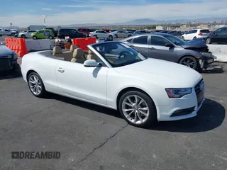 2014 Audi A5 Premium with VIN WAUAFAFH2EN005620, listed as a IAAI auction lot 41901175 with 82,493 mi miles and . Bid and sale history available at DreamBid. Image 1.