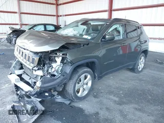 2018 Jeep Compass Altitude with VIN 3C4NJDBB4JT238950, listed as a IAAI auction lot 41815682 with 85,598 mi miles and . Bid and sale history available at DreamBid. Image 18.