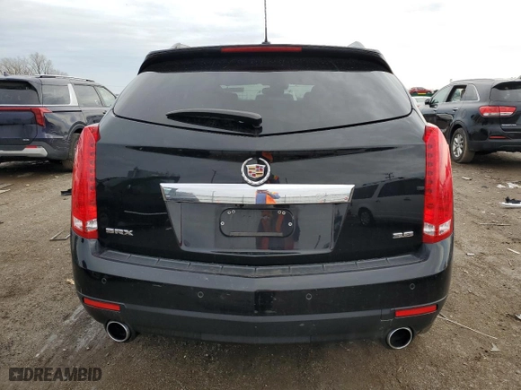 2015 Cadillac SRX Luxury Collection with VIN 3GYFNBE33FS518982, listed as a Copart auction lot 43699705 with 74,928 mi miles and Salvage Title. Bid and sale history available at carsss.com. Image 6.