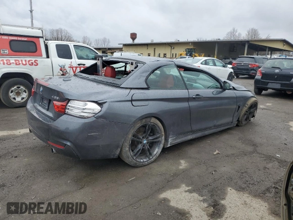2015 BMW 4 Series 435i xDrive with VIN WBA3T7C56FP942328, listed as a Copart auction lot 52410695 with Not provided miles and Salvage title. Bid and sale history available at DreamBid. Image 3.