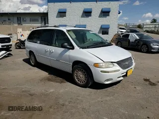 1998 Chrysler Town & Country LXi with VIN 1C4GP64L2WB637437, listed as a Copart auction lot 70504424 with 82,972 mi miles and Salvage Title. Bid and sale history available at carsss.com. Image 11.