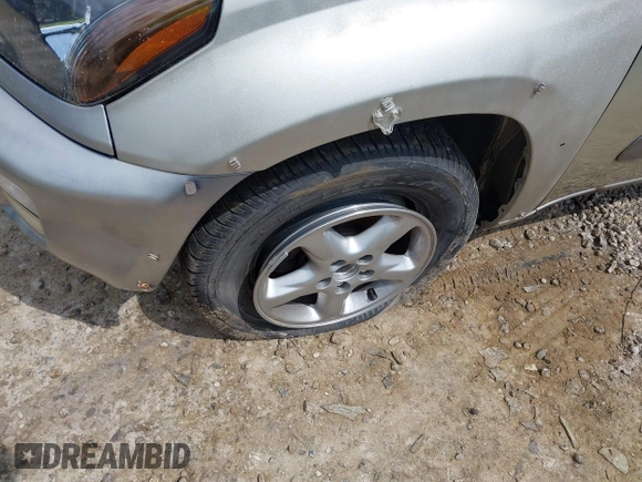 2001 Toyota RAV4 with VIN JTEHH20V810073911, listed as a IAAI auction lot 42392512 with 77,796 mi miles and . Bid and sale history available at DreamBid. Image 6.