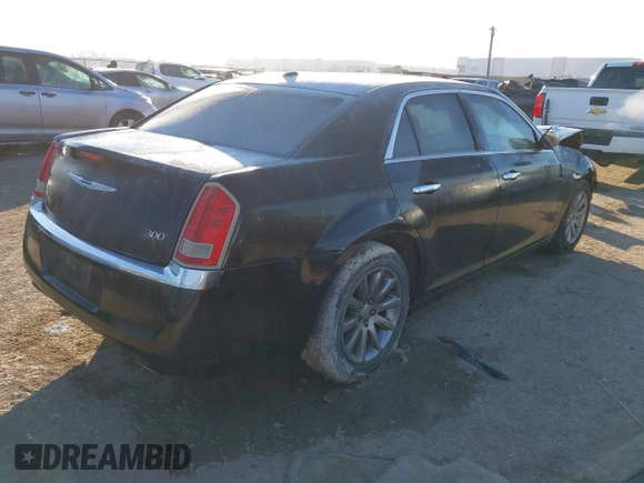 2011 Chrysler 300 Limited with VIN 2C3CA5CG2BH598580, listed as a IAAI auction lot 41330840 with 185,821 mi miles. Bid and sale history available at carsss.com. Image 4.