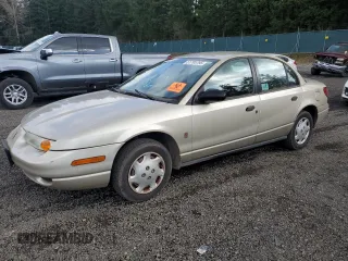2001 Saturn SL z VIN 1G8ZG52851Z213567, wystawiony jako Copart lot #51795795 z przebiegiem Nie podano mil oraz Szkody całkowita. Historia ofert i sprzedaży dostępna na DreamBid. Obrazek 1.
