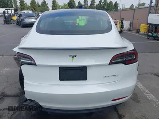 2020 Tesla Model 3 Performance z VIN 5YJ3E1EC9LF641242, wystawiony jako IAAI lot #42380146 z przebiegiem Nie podano mil oraz . Historia ofert i sprzedaży dostępna na DreamBid. Obrazek 17.