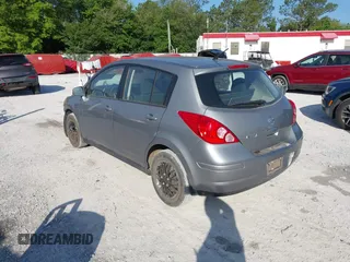 2012 Nissan Versa S with VIN 3N1BC1CP8CK242212, listed as a IAAI auction lot 42027327 with 117,118 mi miles. Bid and sale history available at carsss.com. Image 3.