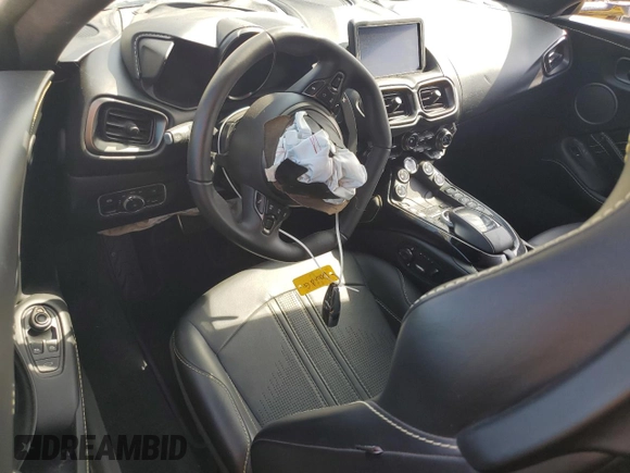2020 Aston Martin Vantage z VIN SCFSMGAW0LGN04408, wystawiony jako Copart lot #60332245 z przebiegiem Nie podano mil oraz Szkoda całkowita • Salvage title. Historia ofert i sprzedaży dostępna na DreamBid. Obrazek 8.