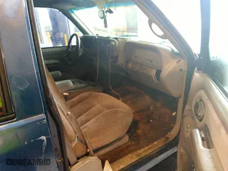 1999 Chevrolet Tahoe with VIN 1GNEC13R9XJ536325, listed as a IAAI auction lot 41475643 with 206,804 mi miles. Bid and sale history available at carsss.com. Image 5.