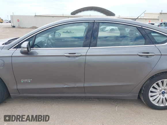 2014 Ford Fusion Titanium with VIN 3FA6P0SU0ER269411, listed as a IAAI auction lot 42163704 with 169,355 mi miles and . Bid and sale history available at DreamBid. Image 14.