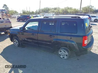 2014 Jeep Patriot Sport with VIN 1C4NJPBB4ED859196, listed as a IAAI auction lot 41815149 with 140,612 mi miles and . Bid and sale history available at carsss.com. Image 14.