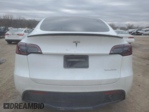 2023 Tesla Model Y Performance with VIN 7SAYGDEF0PF791552, listed as a Copart auction lot 44592545 with 29,075 mi miles and Salvage Title. Bid and sale history available at DreamBid. Image 6.