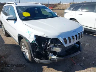 2020 Jeep Cherokee Latitude with VIN 1C4PJLCB2LD629458, listed as a IAAI auction lot 41616505 with 55,651 mi miles. Bid and sale history available at carsss.com. Image 6.