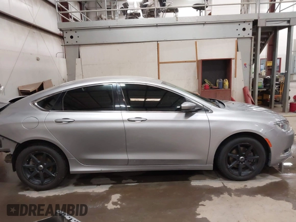 2015 Chrysler 200 Limited with VIN 1C3CCCAB2FN698701, listed as a IAAI auction lot 42073888 with 112,266 mi miles and . Bid and sale history available at DreamBid. Image 14.