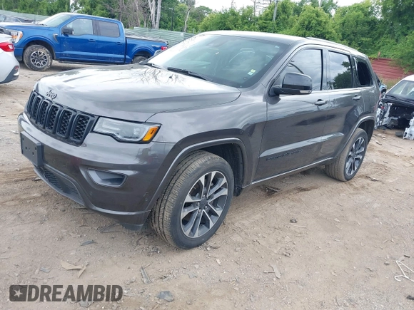 2021 Jeep Grand Cherokee 80th Anniversary with VIN 1C4RJFBG8MC728364, listed as a IAAI auction lot 39803814 with 34,000 mi miles and . Bid and sale history available at DreamBid. Image 17.