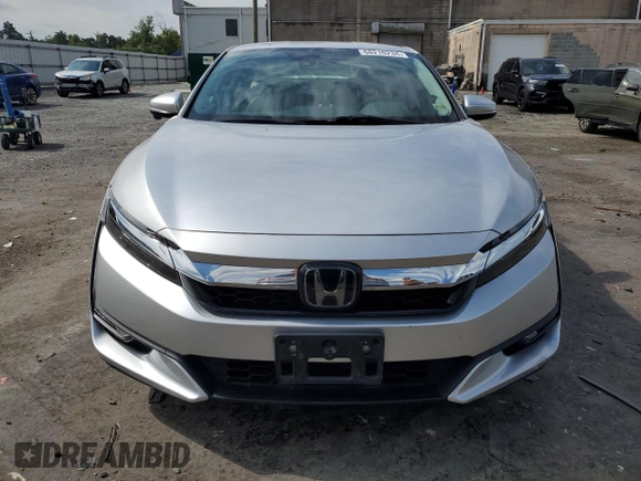 2019 Honda Clarity Plug-In Hybrid with VIN JHMZC5F18KC000064, listed as a Copart auction lot 68210234 with 70,273 mi miles and Salvage Title. Bid and sale history available at carsss.com. Image 5.