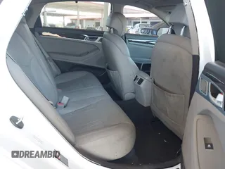 2018 Genesis G80 3.8L with VIN KMHGN4JE3JU216089, listed as a IAAI auction lot 42576639 with 57,382 mi miles and . Bid and sale history available at DreamBid. Image 8.