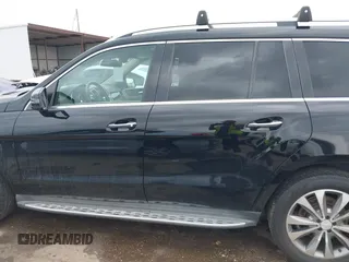 2014 Mercedes-Benz GL 450 with VIN 4JGDF7CE0EA372225, listed as a IAAI auction lot 42141012 with 158,045 mi miles and . Bid and sale history available at DreamBid. Image 14.