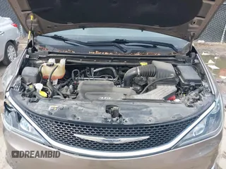 2017 Chrysler Pacifica Touring L with VIN 2C4RC1BG9HR831786, listed as a IAAI auction lot 41928645 with 37,811 mi miles and . Bid and sale history available at DreamBid. Image 10.