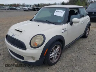 2007 MINI Hardtop S with VIN WMWMF73527TL89861, listed as a IAAI auction lot 41953013 with 111,222 mi miles and . Bid and sale history available at DreamBid. Image 2.