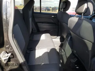 2010 Jeep Patriot Sport with VIN 1J4NF2GB8AD519311, listed as a Copart auction lot 53799085 with 203,762 mi miles and Salvage Title. Bid and sale history available at carsss.com. Image 11.