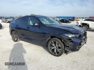 2025 BMW X6 M60i with VIN 5UX43EX01S9X19069, listed as a Copart auction lot 42613105 with 6,909 mi miles and Salvage Title. Bid and sale history available at carsss.com. Image 4.