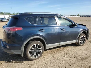 2018 Toyota RAV4 Hybrid SE with VIN JTMJJREV2JD230126, listed as a Copart auction lot 62574005 with 196,846 mi miles and Salvage title. Bid and sale history available at DreamBid. Image 3.