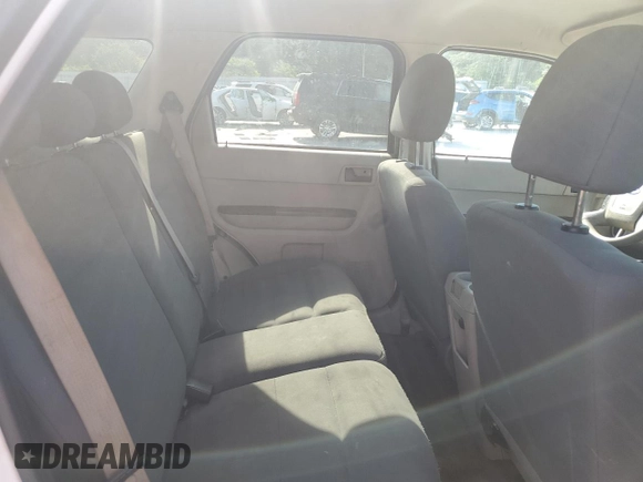 2009 Ford Escape XLS with VIN 1FMCU02719KB53740, listed as a Copart auction lot 55210035 with 144,672 mi miles and Salvage title. Bid and sale history available at DreamBid. Image 10.