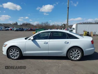 2015 Audi A6 2.0T Premium Plus with VIN WAUGFAFC7FN025958, listed as a IAAI auction lot 41888489 with 100,600 mi miles. Bid and sale history available at carsss.com. Image 14.