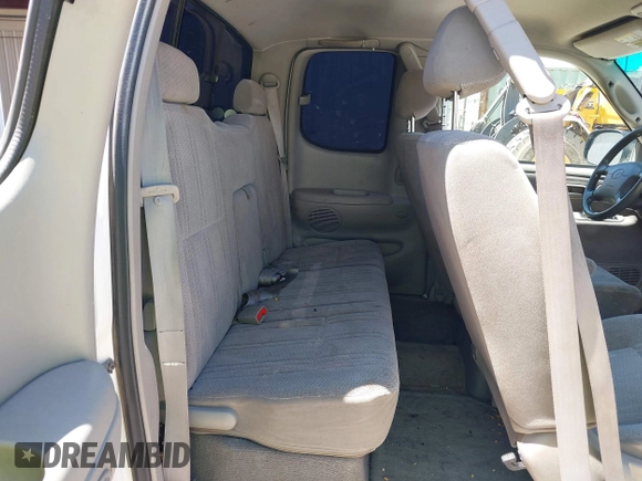 2000 Toyota Tundra SR5 with VIN 5TBRT3413YS097893, listed as a IAAI auction lot 42221710 with 213,142 mi miles and . Bid and sale history available at DreamBid. Image 8.