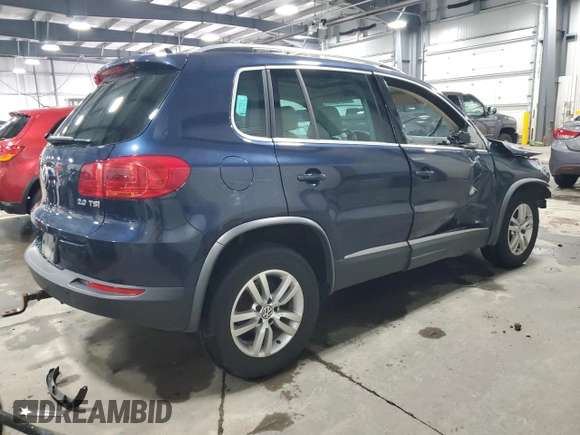 2012 Volkswagen Tiguan SEL with VIN WVGAV7AX2CW534687, listed as a Copart auction lot 53040945 with 153,979 mi miles and Salvage Title. Bid and sale history available at DreamBid. Image 3.