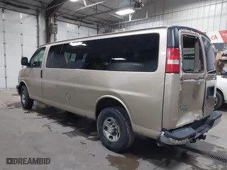 2012 Chevrolet Express Passenger 1LT with VIN 1GAZG1FAXC1127760, listed as a IAAI auction lot 41629882 with 311,110 mi miles. Bid and sale history available at carsss.com. Image 3.