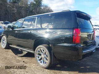 2019 Chevrolet Suburban Premier with VIN 1GNSKJKCXKR111502, listed as a IAAI auction lot 41075435 with 134,555 mi miles and . Bid and sale history available at DreamBid. Image 3.