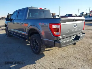 2021 Ford F-150 XL with VIN 1FTFW1E8XMFB77980, listed as a IAAI auction lot 41695579 with 42,802 mi miles. Bid and sale history available at carsss.com. Image 3.