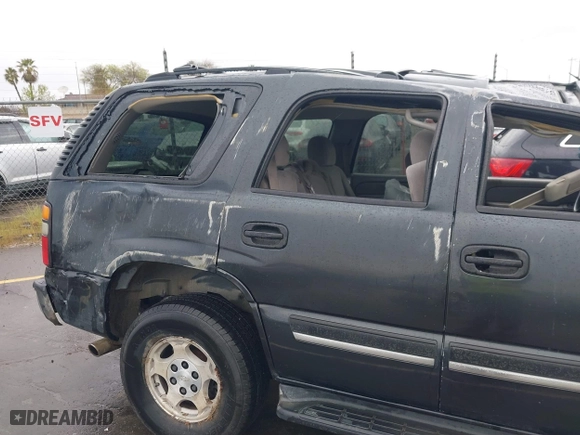 2005 Chevrolet Tahoe Z71 with VIN 1GNEC13T15R205653, listed as a IAAI auction lot 41808672 with 210,261 mi miles. Bid and sale history available at carsss.com. Image 13.
