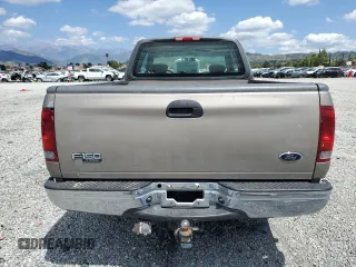 2001 Ford F-150 with VIN 1FTPX17L21NA37619, listed as a Copart auction lot 56922485 with 212,148 mi miles and Salvage title. Bid and sale history available at DreamBid. Image 6.