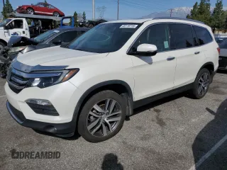 2017 Honda Pilot Touring with VIN 5FNYF6H91HB080607, listed as a Copart auction lot 49119715 with 61,490 mi miles and Salvage Title. Bid and sale history available at carsss.com. Image 1.