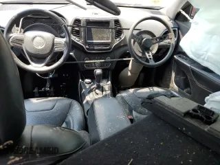 2019 Jeep Cherokee Limited with VIN 1C4PJMDX1KD345303, listed as a Copart auction lot 59298185 with 166,168 mi miles and Salvage title. Bid and sale history available at DreamBid. Image 8.