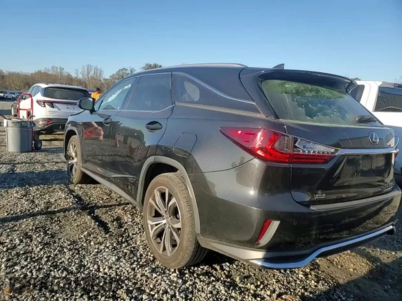 2021 Lexus RX 350L with VIN JTJHZKEA1M2021324, listed as a Copart auction lot 79802474 with 84,221 mi miles and Salvage title. Bid and sale history available at DreamBid. Image 11.