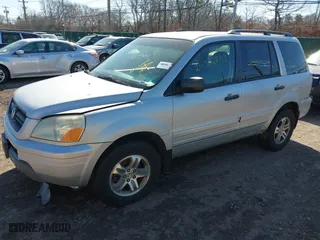 2004 Honda Pilot EX with VIN 2HKYF18524H576155, listed as a IAAI auction lot 41831888 with 999,999 mi miles. Bid and sale history available at carsss.com. Image 2.