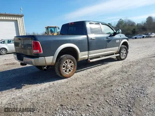 2016 Ram 2500 Laramie with VIN 3C6UR5FL3GG124072, listed as a IAAI auction lot 41305989 with 151,283 mi miles. Bid and sale history available at carsss.com. Image 4.