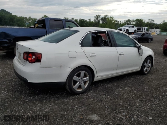 2009 Volkswagen Jetta SE with VIN 3VWRZ71K69M120110, listed as a Copart auction lot 64813905 with 114,552 mi miles and Salvage title. Bid and sale history available at DreamBid. Image 3.